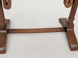 a small table with a wooden top on a white background