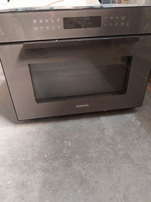an image of a stainless steel oven in a kitchen