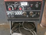 une petite machine qui se trouve dans le garage