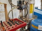 a picture of a machine that is working on a piece of wood