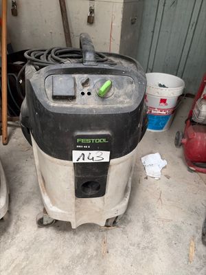 a vacuum that is sitting in the garage