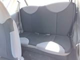 a seat in the back of a car that is empty