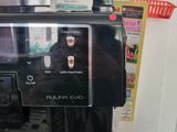 a coffee machine that is sitting on top of a counter