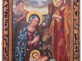 un tableau représentant la Nativité de Jésus et l'Enfant Jésus