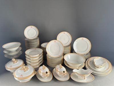many different types of plates and bowls on the table