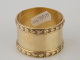 un rond de serviette en or 18 carats