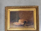 une image d'un tableau sur le mur d'une pièce