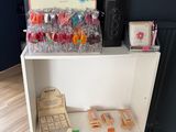 a shelf that has a lot of candy on it