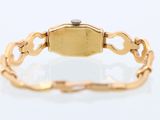 an 18k yellow gold ladies ' s bracelet with a diamond clasp