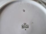 a white plate with a black and white design on it