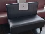 a couch and a table in a room with a large window