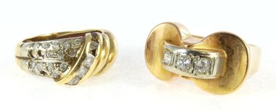 two pairs of diamond earrings on a white surface