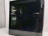 a black computer case sitting on a white surface