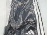 a bag of clothing that is sitting on a table