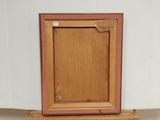 a picture of a picture frame on top of a wooden box