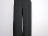 a close up of a mannequin mannequin wearing a black pantsuit