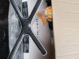 a box with a computer and a television inside of it