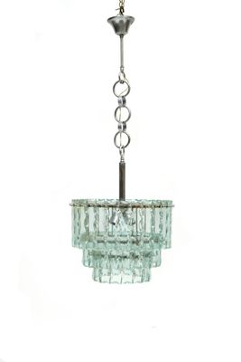 an image of a glass chandelier hanging from a ceiling
