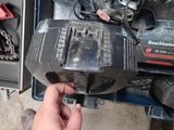 a person that is holding a tool in their hand