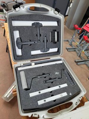 a case with a gun inside of it on a table