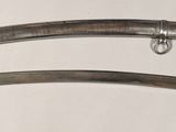 two swords that are on display on a table