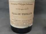 a bottle of wine that is sitting on a table