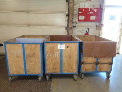 two boxes that are sitting in a garage