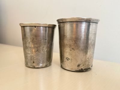 pair of antique silverplated ice buckets with lids