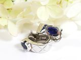 sterling silver ring with blue sapphire and black onyx