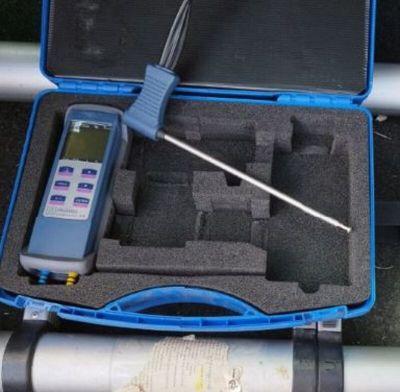 a blue case that has a digital thermometer in it