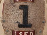 a close up of a fireman ' s helmet with the number 1 on it