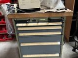 an image of a workbench with a lot of tools on it