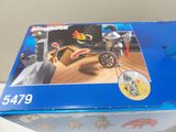 a box of playmobil with a motorcycle and rider on it