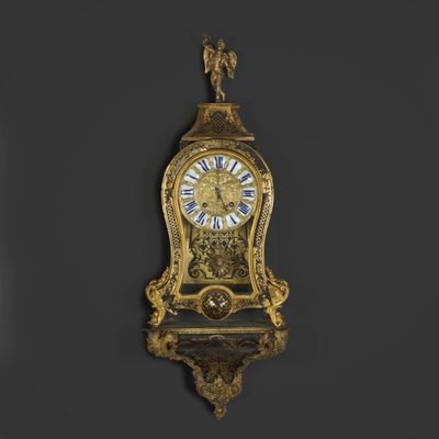 a clock that is hanging on the wall in the room