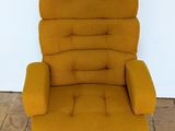 an image of a yellow chair sitting on top of a hard wood floor