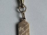 an image of a keychain that has a tag on it