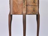 an image of a wooden table with drawers and a shelf