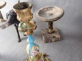 three vases sitting on a table next to each other
