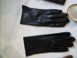 a pair of gloves and a pair of shoes on a table