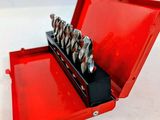 an image of a red tool box with drill bits in it