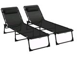 two black lounge chairs sitting next to each other on a white background