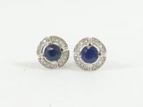 a pair of sapphire and diamond earrings