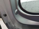 a close up of a car door with a window open