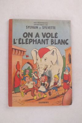 un vieux livre pour enfants avec un éléphant sur la couverture
