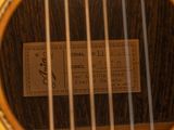 a close up of a guitar with a label on it