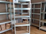 a room with a lot of shelvings in it