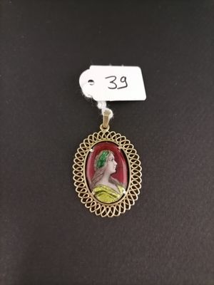 a picture of a necklace with a picture of a woman on it