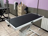a black and white table in the middle of a room