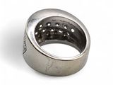 an image of a silver ring with holes in it