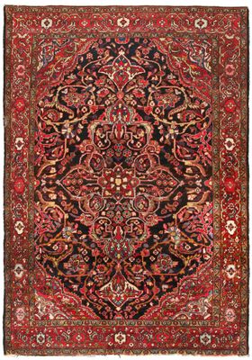 an antique persian rug with red and black colors